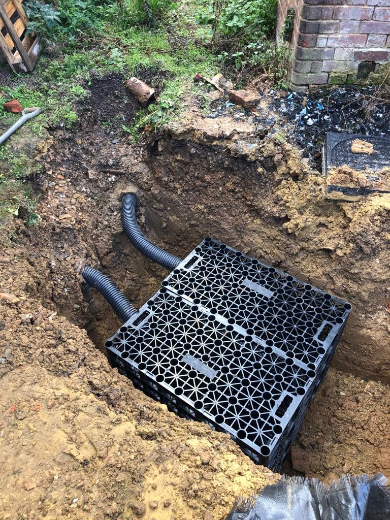 Soakaway drainage preventing standing water in a London garden
